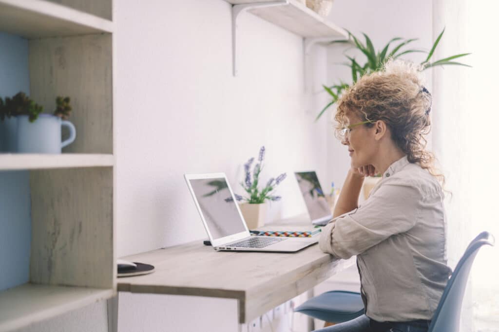 remote employee using remote security solutions on laptop